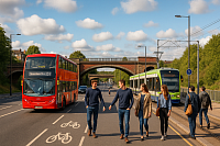 A wide-angle view of a newly developed transport interchange in a small British town shows buses, a tram, and cyclists navigating clean, modern infrastructure. Pedestrians walk safely along widened pavements, and construction continues in the background, symbolising renewed investment in neglected communities and inclusive mobility across the UK.